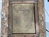 an old picture frame with a picture of a man on it