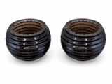 pair of black ceramic bowls on white background with white background