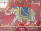 a picture of an elephant that is painted on the wall