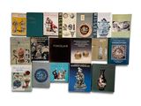 a lot of books that are sitting on a table