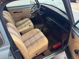 a picture of the interior of a car with the door open