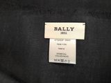 a label on the back of a black shirt that says bally