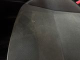 a car seat with a hole in the middle of it