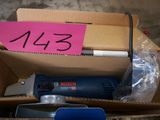 a box with a drill and other tools inside of it