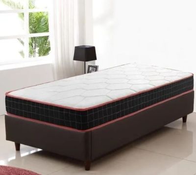 an image of a bed with a mattress on top of it in a room