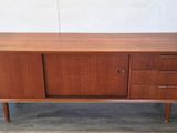 a wooden sideboard with two drawers and two doors