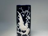 chinese black and white porcelain vase with a dragon on a branch