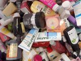 many different types of skin care products in a bin