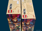two boxes of lego minifigurs sitting side by side