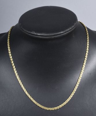 a gold chain necklace on a mannequin mannequin mannequin mannequin mannequin mannequin mannequin mannequin manne