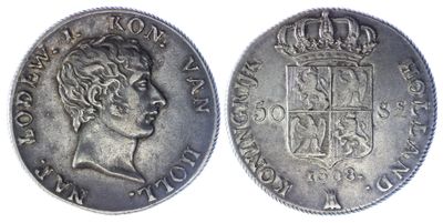 a close up of a coin with a crown on top of it