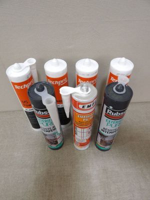 several different types of glues are lined up in a row