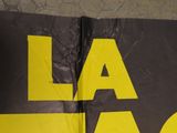 a large sign that says sale on the side of a building