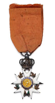 l'image d'une médaille surmontée d'une étoile
