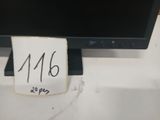 a computer monitor sitting on a desk with a price tag in front of it