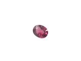 a close up of a pink diamond on a white background