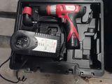 an image of a cordless drill in a case