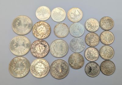 a close up of a bunch of coins on a table