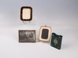 three small objects that are sitting on a white surface