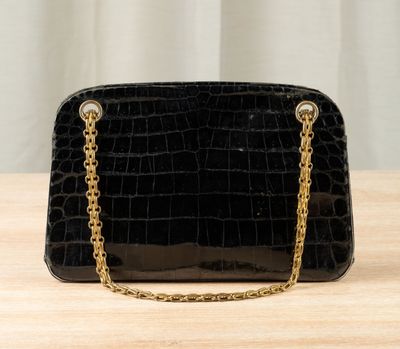 black croc embossed clutch bag with gold chain strap
