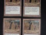 quatre cartes sur lesquelles figure, au centre, l'image d'un bâtiment