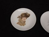 two plates with pictures of a woman and a man on them