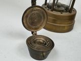 a small metal object that is sitting on a table
