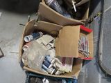 a box full of assorted items sitting on the floor