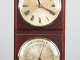a wooden clock with roman numerals and a barometer