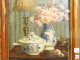 a painting of flowers in a vase on a table