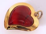 an image of a red glass heart shaped pendant on a gold plated chain