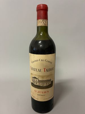 a bottle of wine that is sitting on a table
