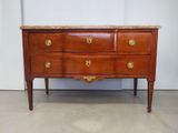 an image of a wooden dresser with marble top and brass handles