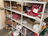 many boxes and boxes on the shelves in the garage