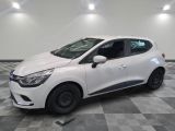 the white car is parked on a checkered floor in the garage