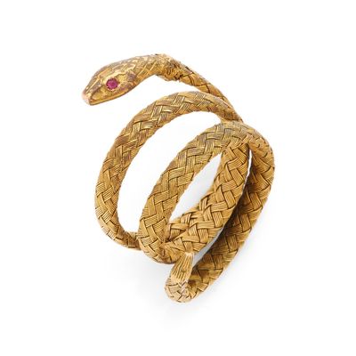 XIXème SIÈCLE BAGUE retenant un serpent enroulé avec un moti…