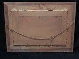 an old picture of a wooden frame with a rope hanging from it