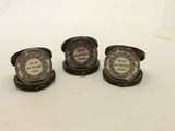 three cuff rings with a picture of a man and a woman on them
