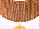 an image of a table lamp with a gold base and a brown shade