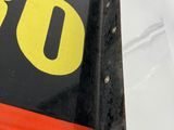 a close up of a sign on a white surface
