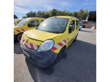 a yellow van that is parked in a parking lot