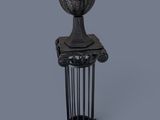 an image of a metal vase with a bird on top of it