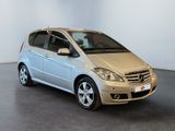 the mercedes b - class is parked in an empty room