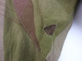 a close up of a piece of fabric with a triangle on it