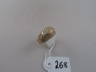 a close up of a gold ring with a price tag on it