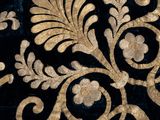 an image of a close up of a black and gold wallpaper