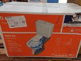a box with a toilet inside of it on a pallet