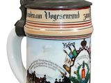 a beer mug that has a picture of a man on a horse