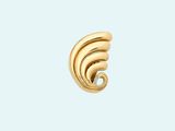 a close up of a gold earring on a white background