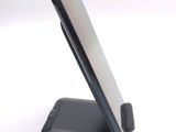 a close up of a cell phone on a stand